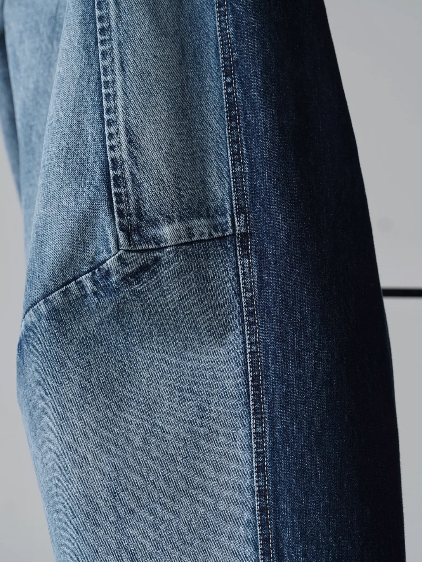 Nomàt | Two-tone Denim Curved Pants Sax Blue