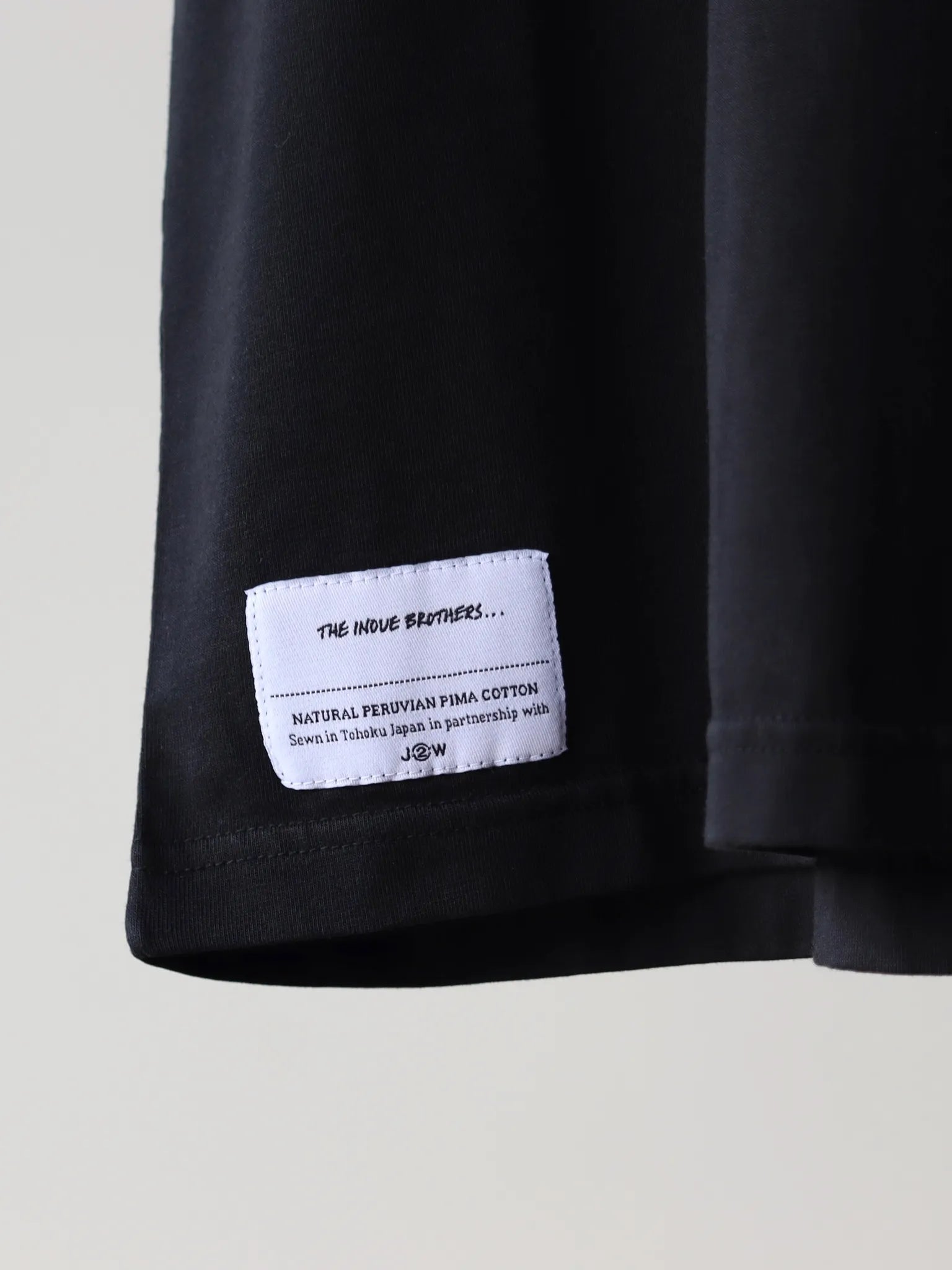 the-inoue-brothers-no-sleeve-top-black-2
