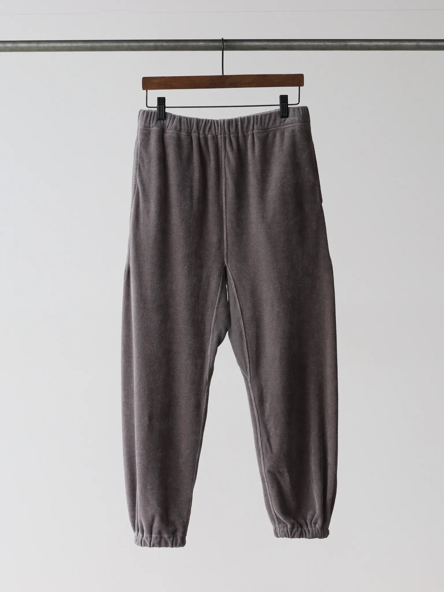 medium-sportswear-warmup-pants-velour-uneven-grey-1